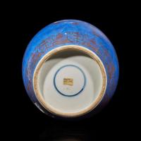 A Chinese powder blue and gilt decorated ovoid jar and cover 灑藍地描金蓋罐