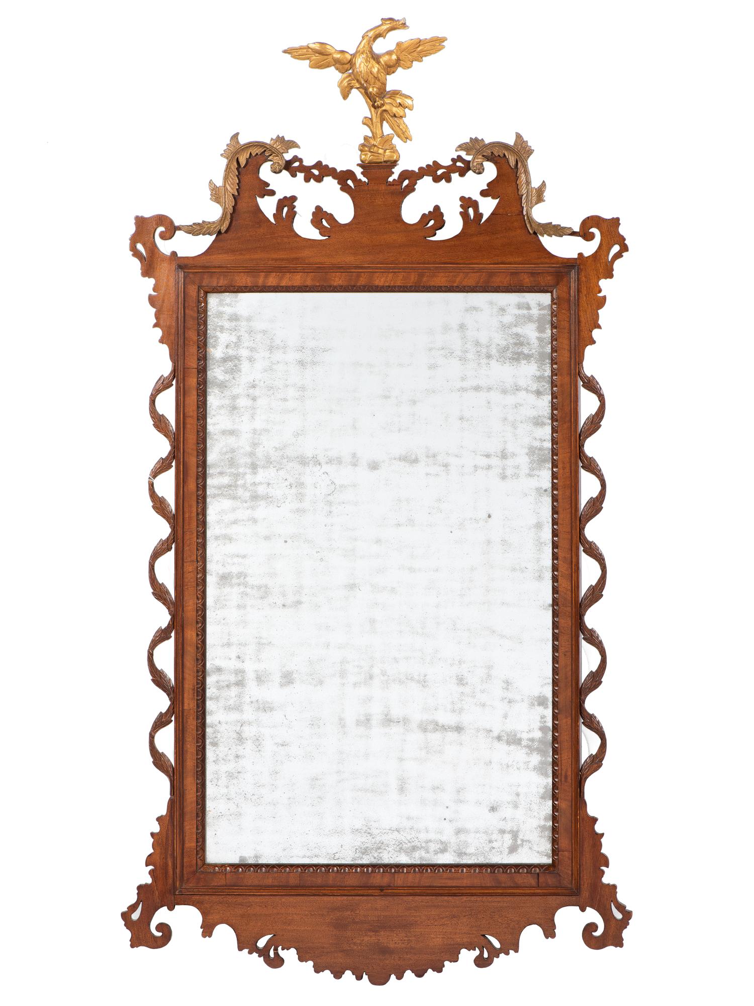 A Rare Chippendale Parcel-Gilt and Carved Mahogany Vine Looking Glass