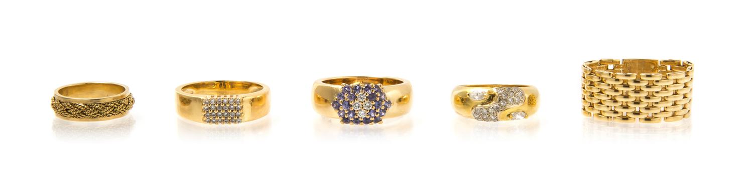 A Collection of 18 Karat Yellow Gold, Diamond and Sapphire Rings, 23.00 dwts.