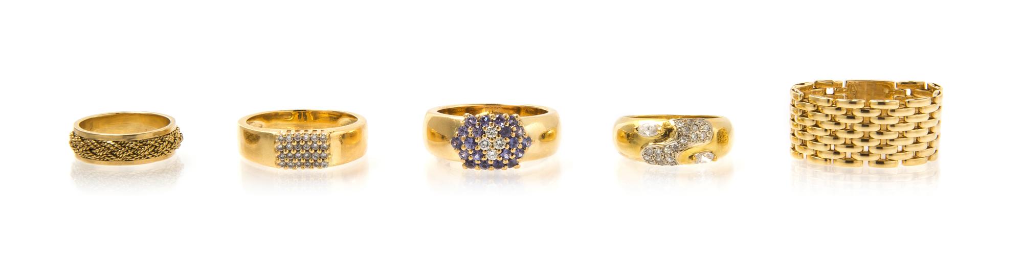 A Collection of 18 Karat Yellow Gold, Diamond and Sapphire Rings, 23.00 dwts.