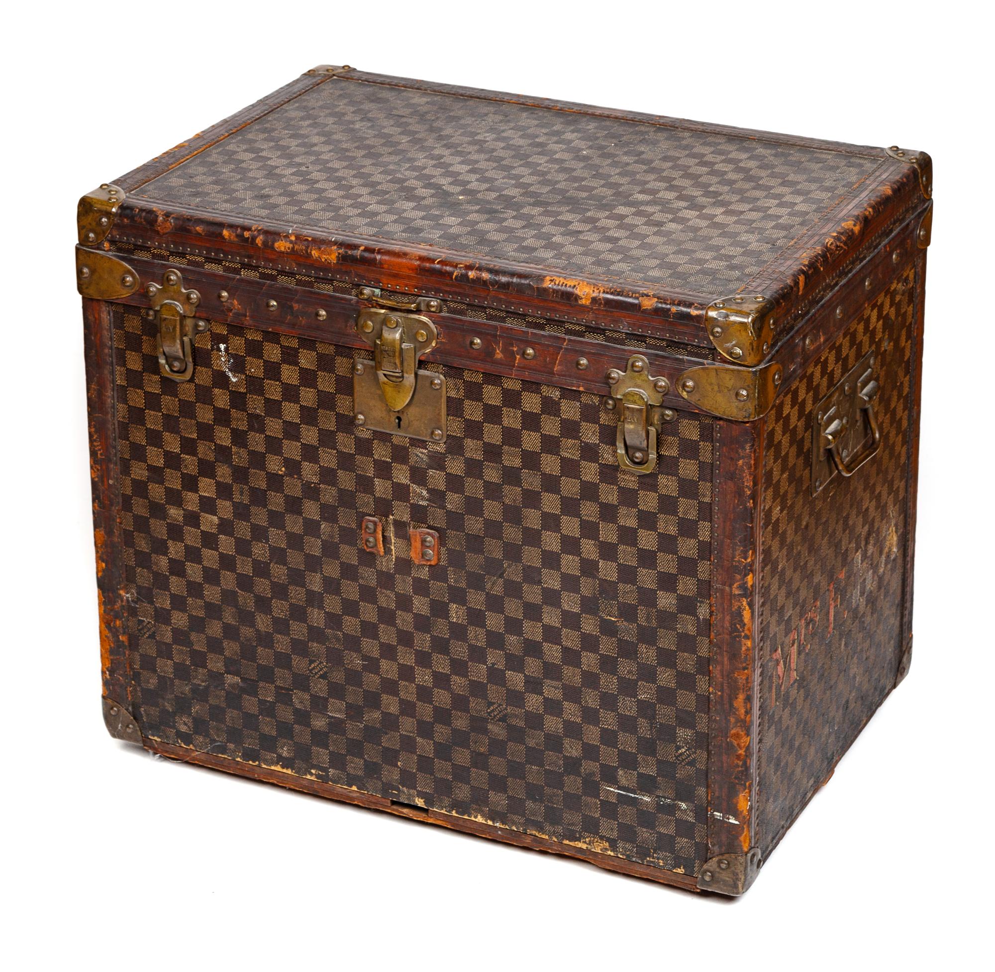 A Louis Vuitton Vintage Damier Steamer Trunk, 20.5" H x 23.5" W x 16.5" D.