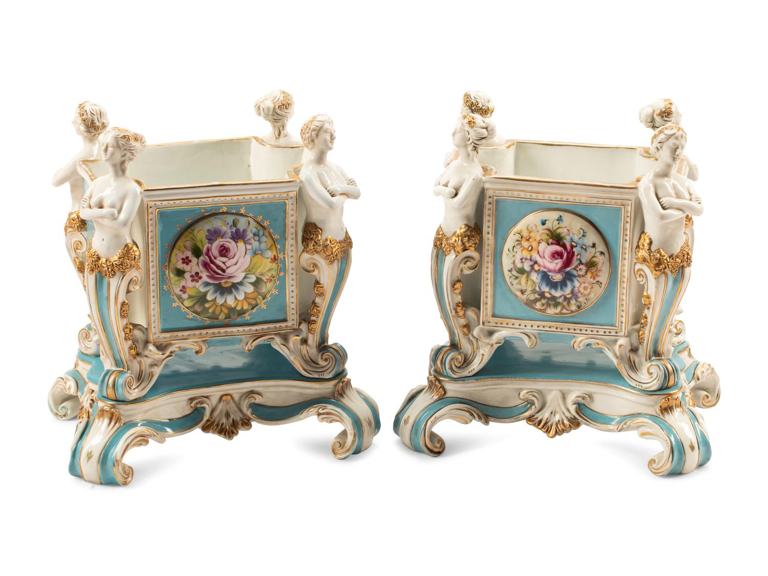 A Pair of Sevres Style Porcelain Cache Pots