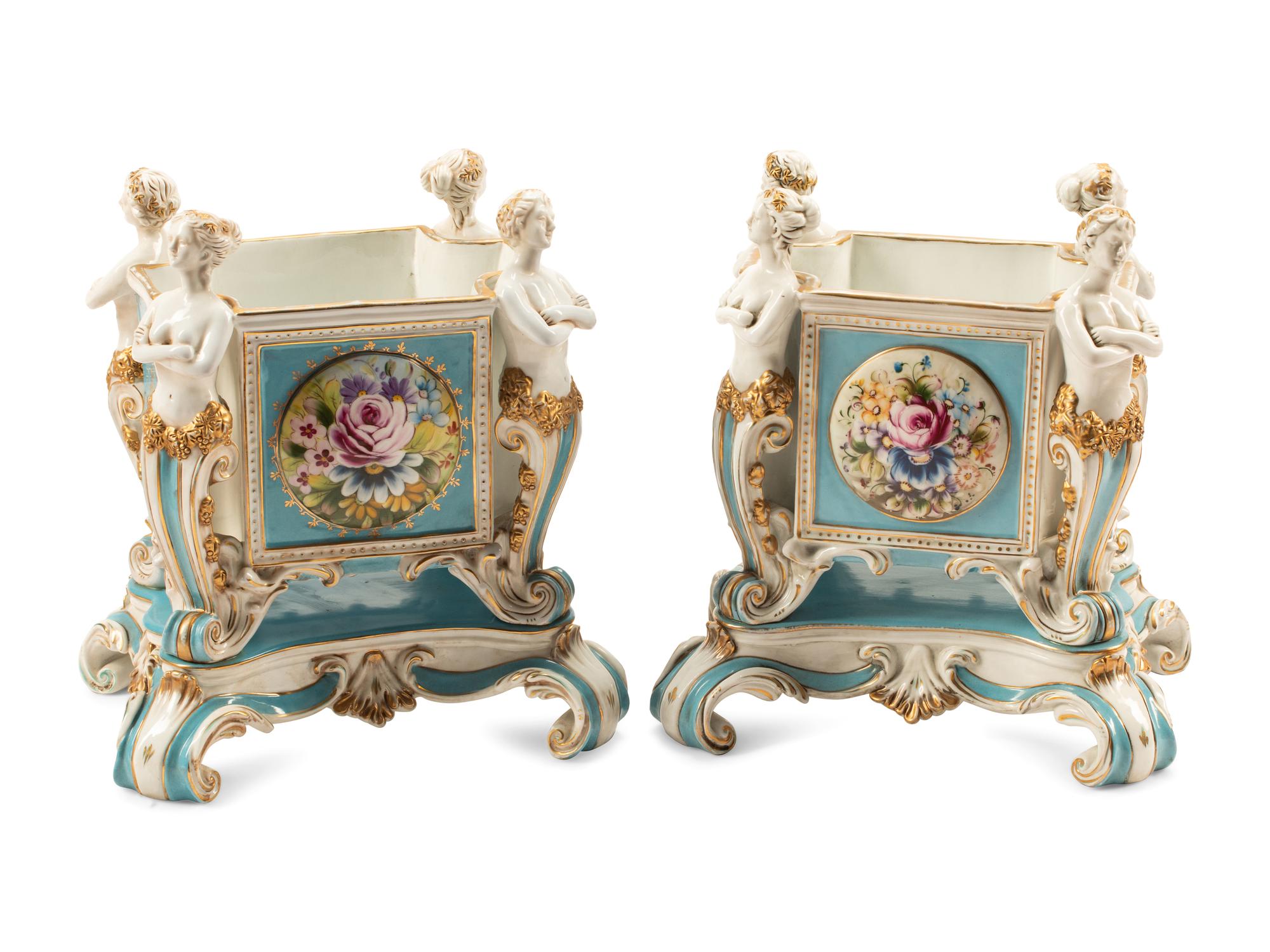 A Pair of Sevres Style Porcelain Cache Pots