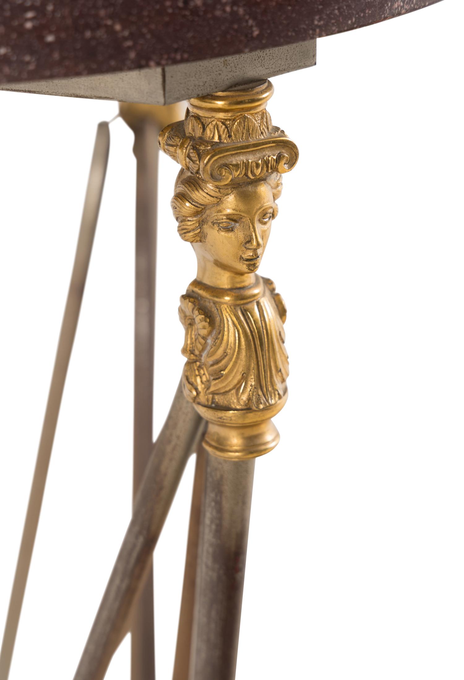 A Pair of Empire Style Gilt Bronze, Steel and Faux Porphyry Guéridons