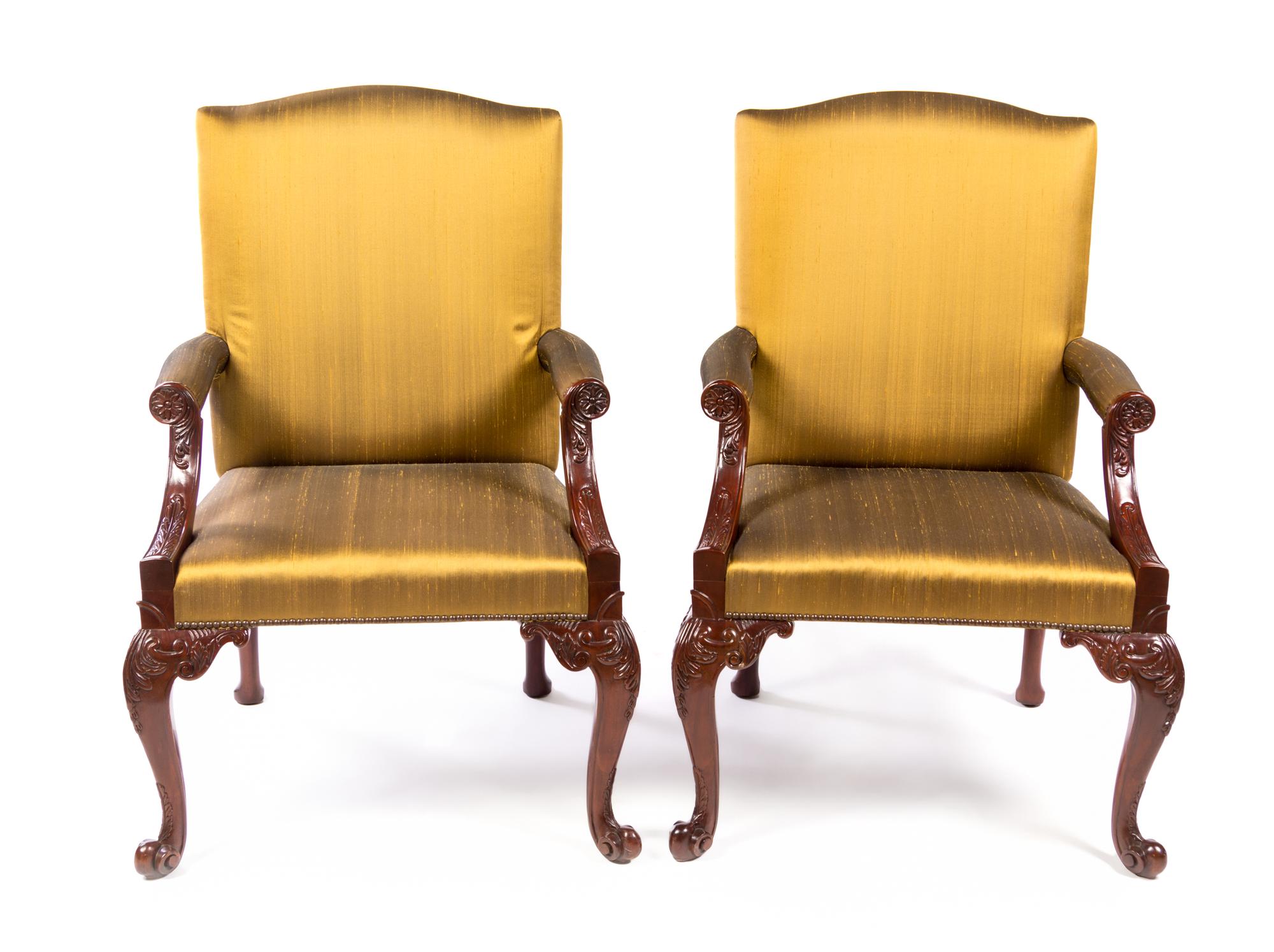 A Pair of Chippendale Style Mahogany Library Chairs Height 40 inches. — BAKER, 20TH CENTURY