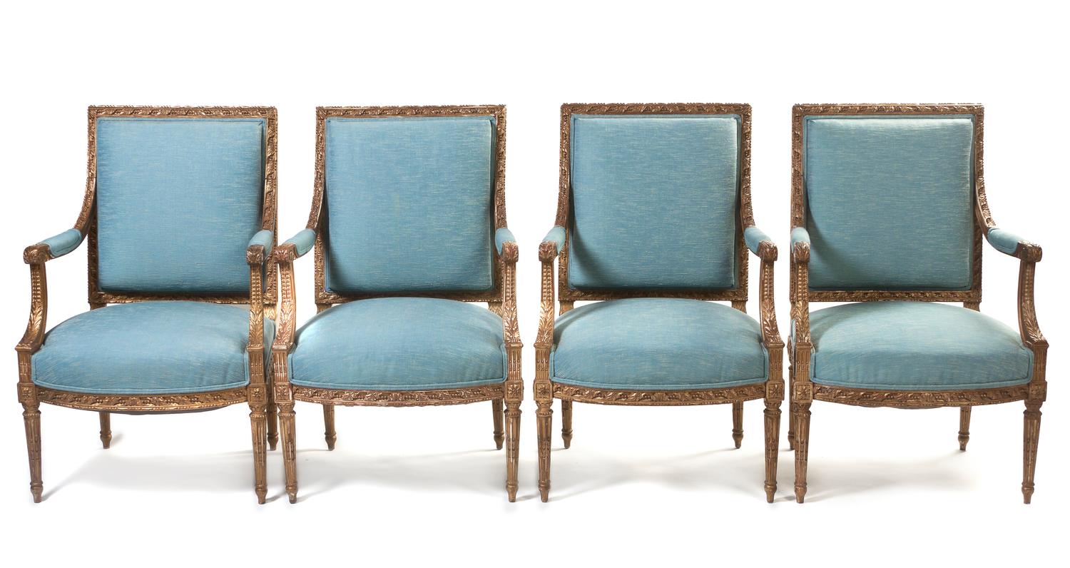 A Set of Four Louis XVI Style Giltwood Open Armchairs, Height 39 inches.
