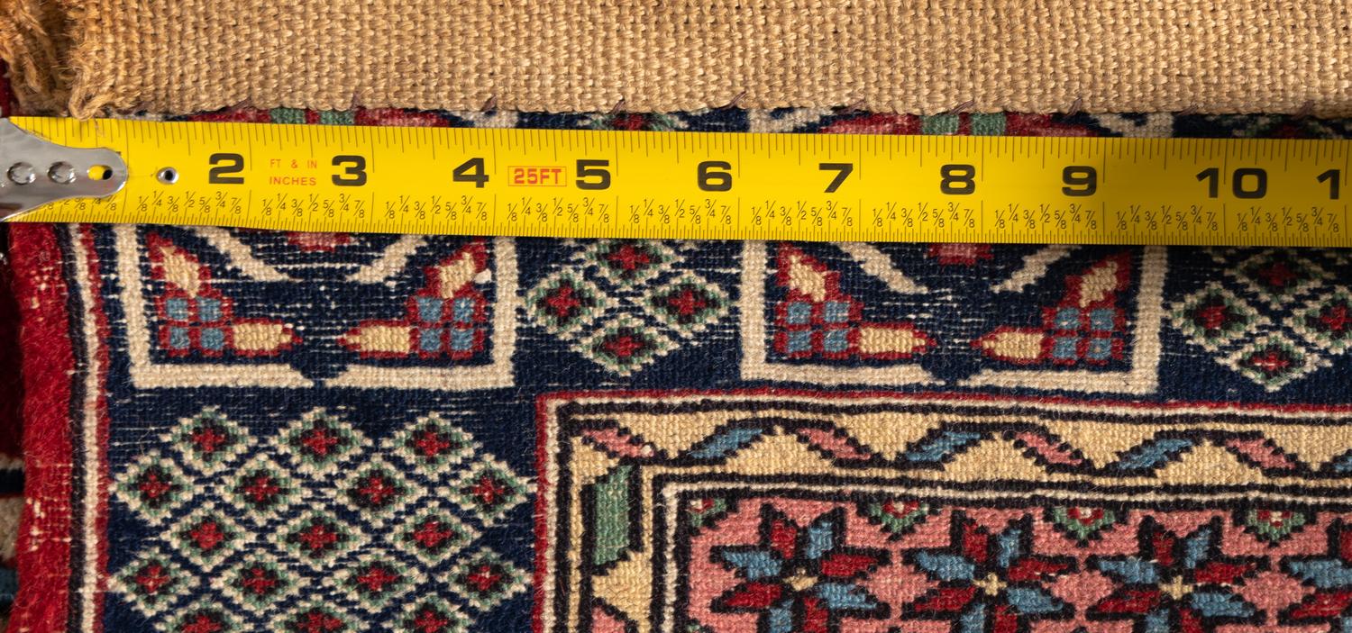 A Persian Wool Prayer Rug