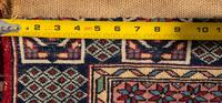 A Persian Wool Prayer Rug