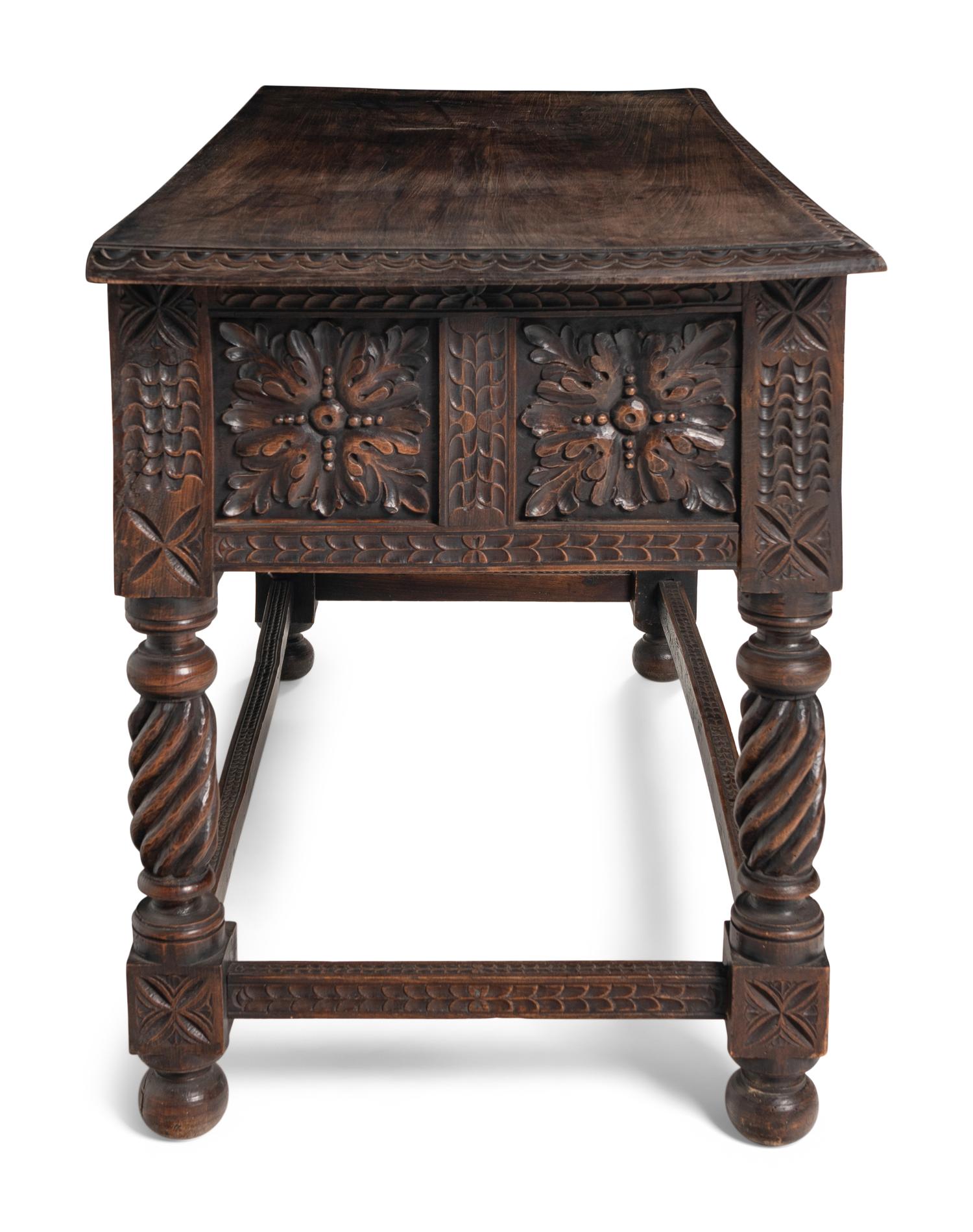 A Jacobean Style Carved Walnut Console Table