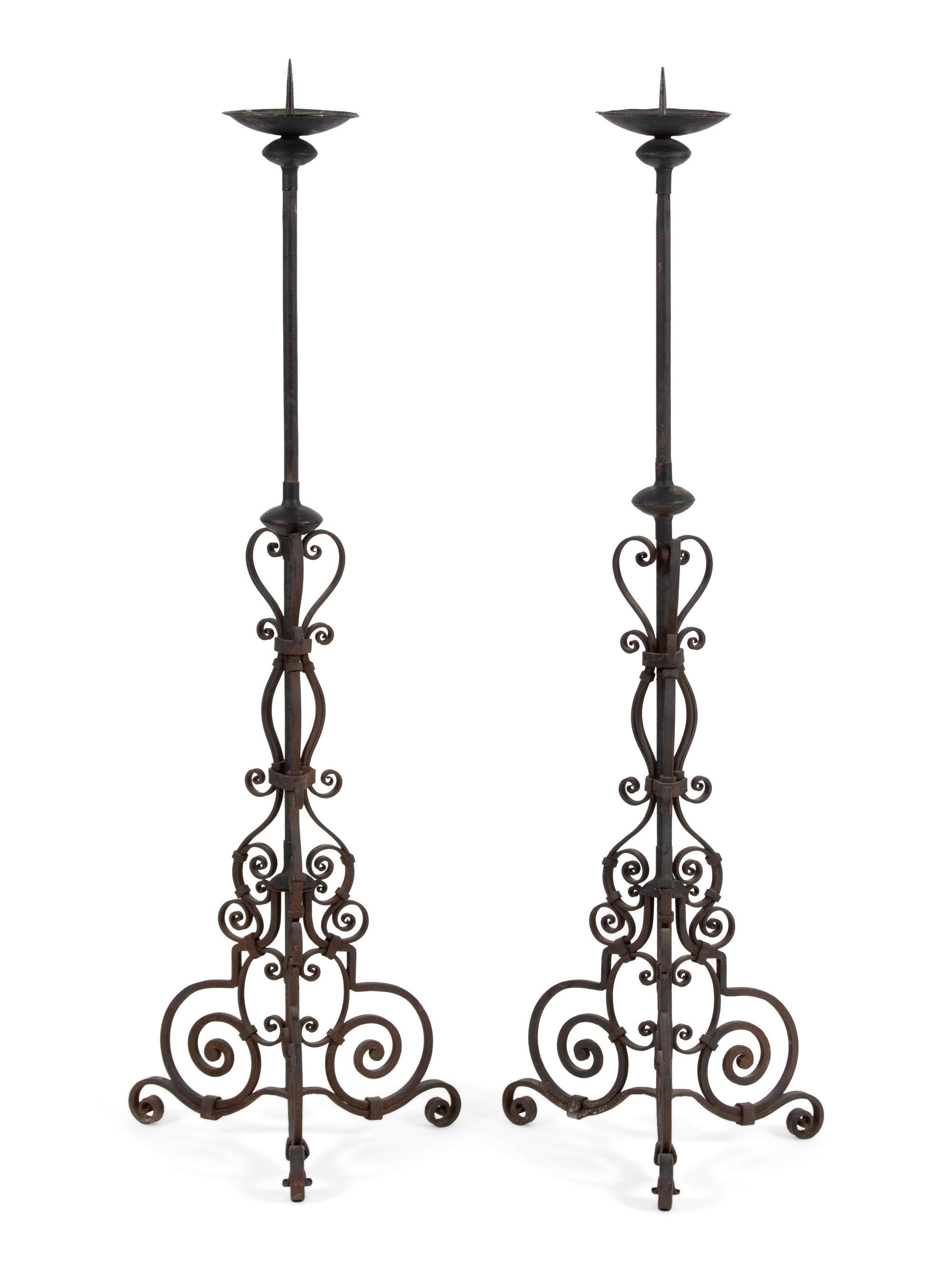 A Pair of Mizner Style Wrought Iron Torcheres