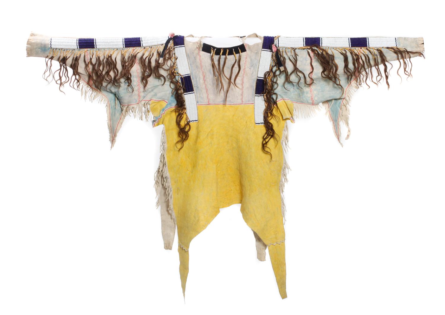 A Richard Conn Reproduction Buckskin Shirt Length approximately 50 inches. — CIRCA 1950