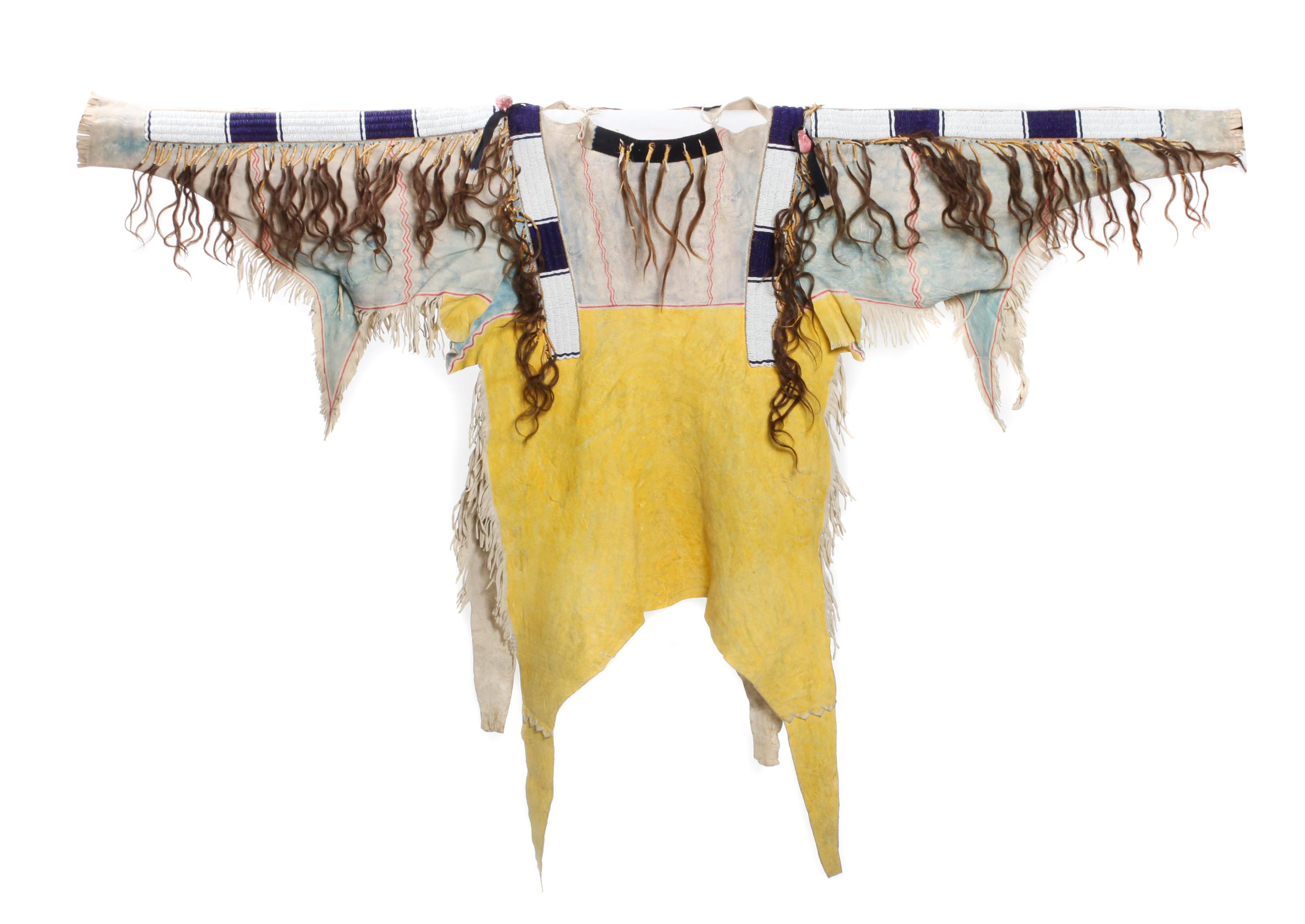 A Richard Conn Reproduction Buckskin Shirt Length approximately 50 inches. — CIRCA 1950