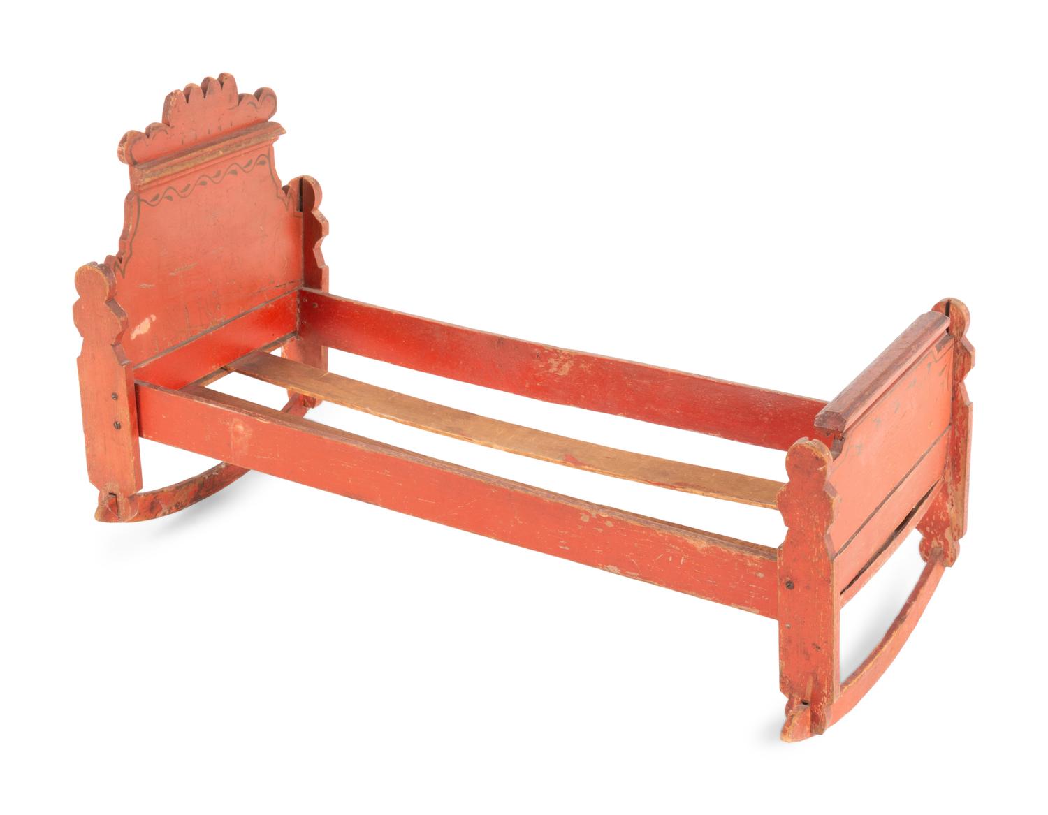A Scandinavian Painted Pine Doll's Bed