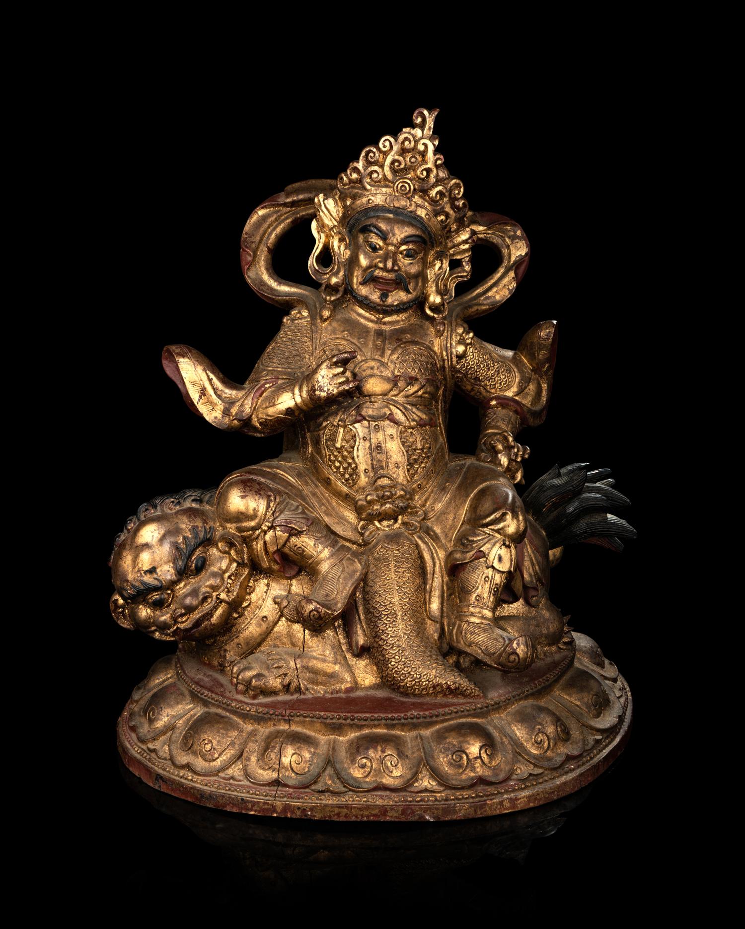 A Large and Rare Sino-Tibetan Gilt Lacquer Wood Figure of Vaishravana