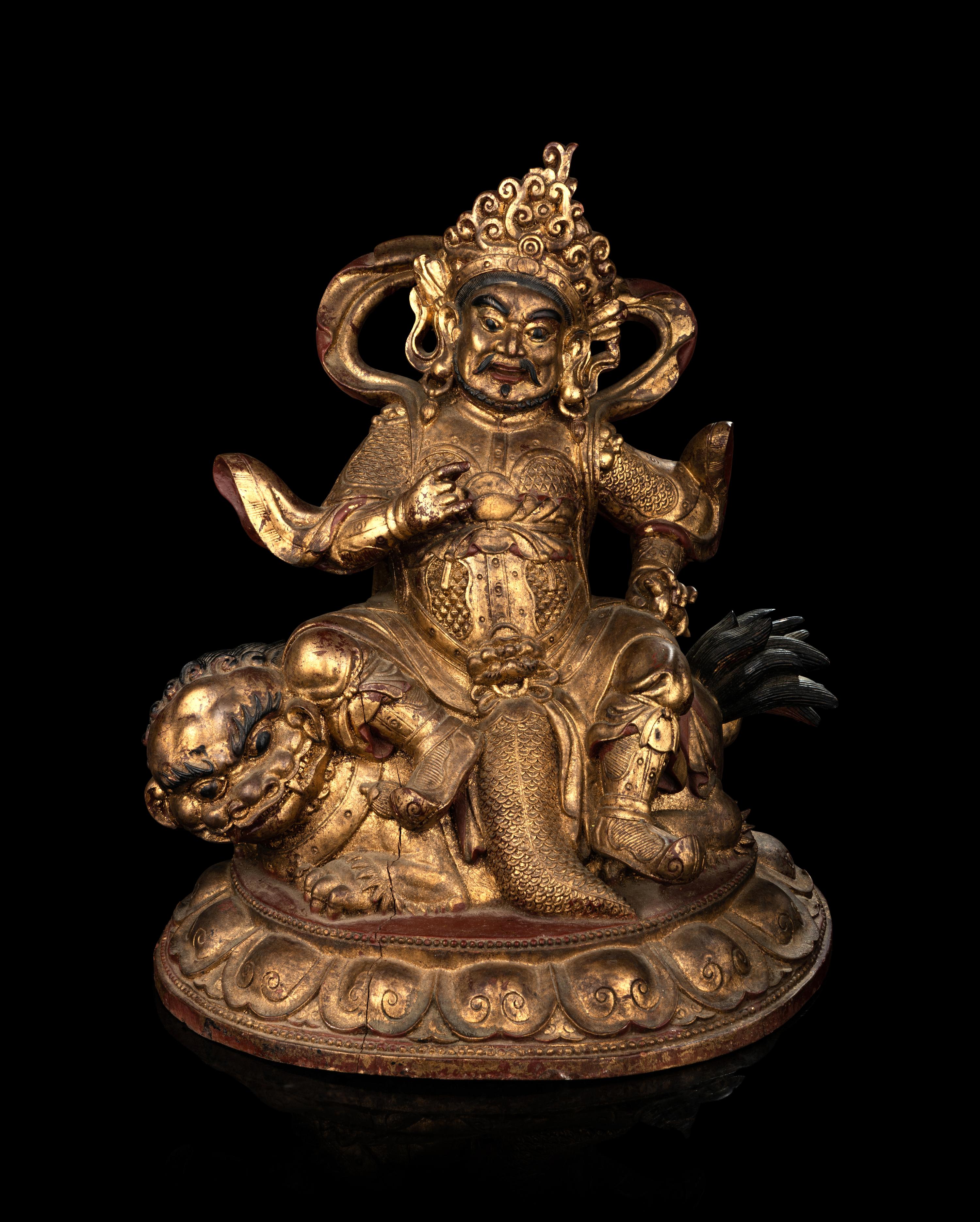 A Large and Rare Sino-Tibetan Gilt Lacquer Wood Figure of Vaishravana