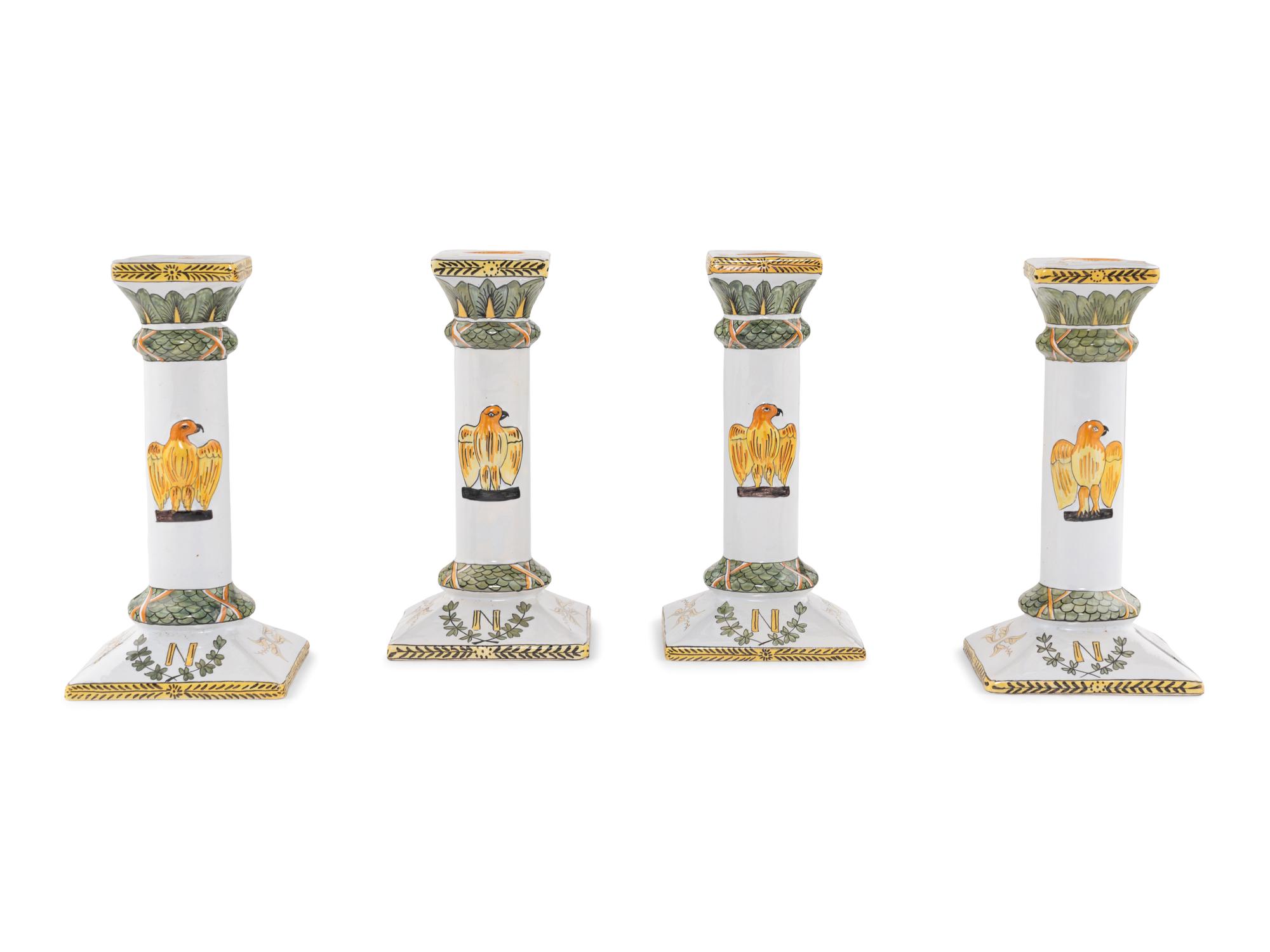 A Set of Four French Faience Candlesticks