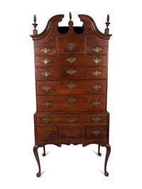 A Queen Anne Style Carved Cherrywood Highboy — NEW ENGLAND, LATE 19TH CENTURY