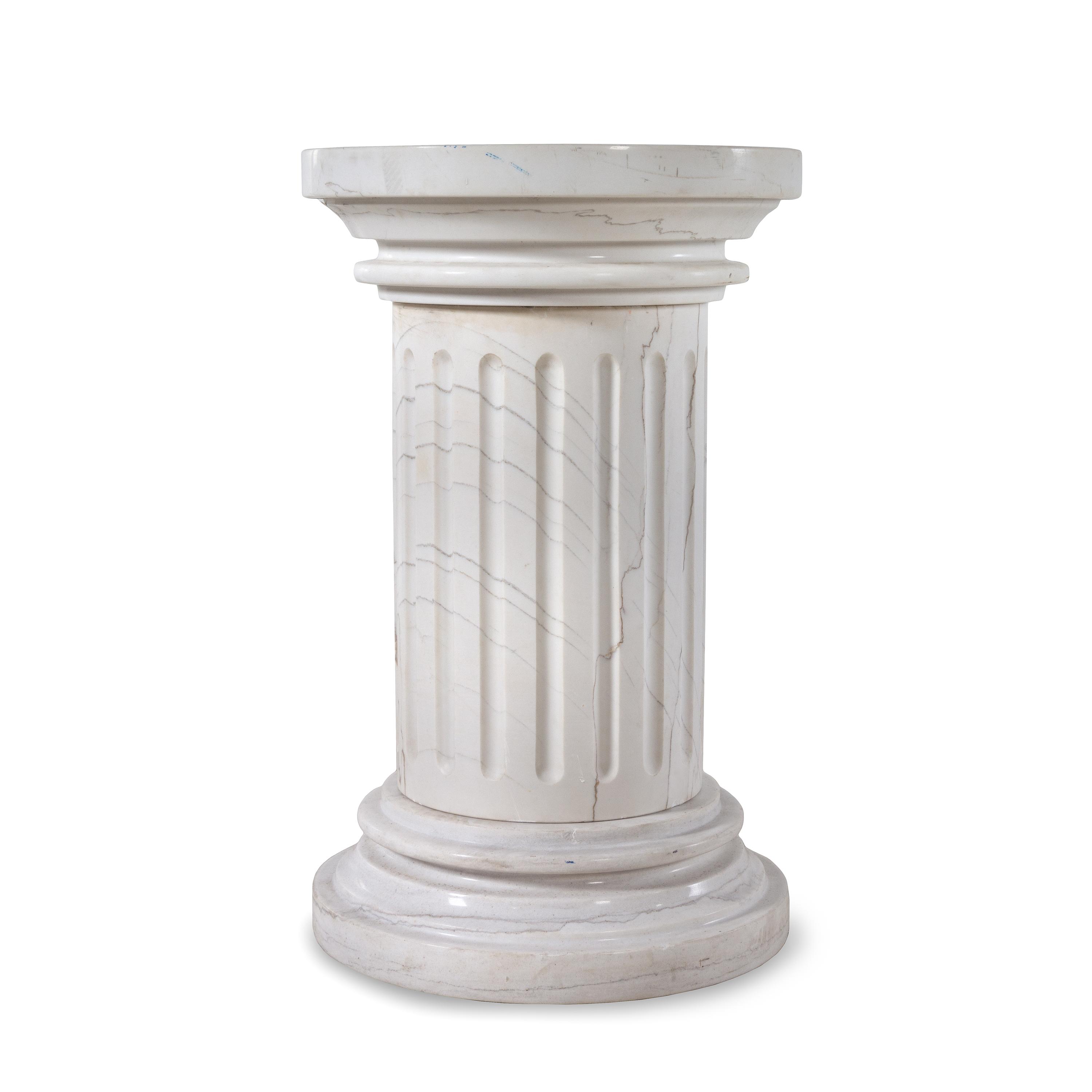 A Carved Marble Pedestal