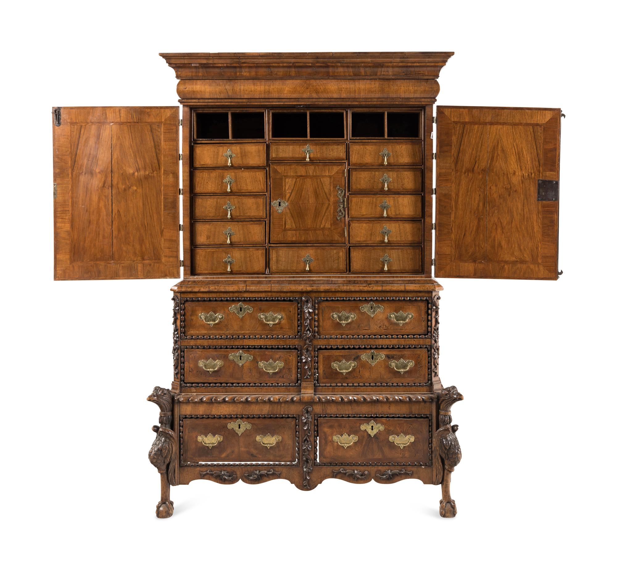 A Continental Baroque Brass Mounted Walnut Cabinet on Chest
