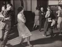 A group of five photographs ( A member of the Wilkins Family Making Biscuits , 1939; Post Office in Blizzard, Aspen, CO , 1941; Negro (Black) Man Entering Movie Theater by Colored Entrance, Belzoni, Miss., 1939; Crossroad and General Store (Mosquito Crossing) Near Greensboro, GA, 1939 (printed 1981); Recreation Evening at Community School Under Direction of WPA Recreational Supervisor (in suit and tie) Coffee County, Alabama, 1939)