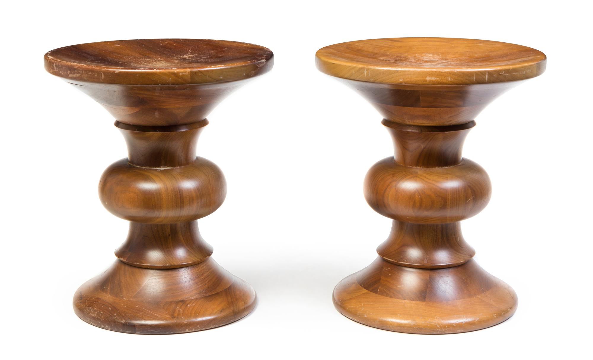 Charles and Ray Eames, HERMAN MILLER, c. 1960, a pair of walnut Time Life stools