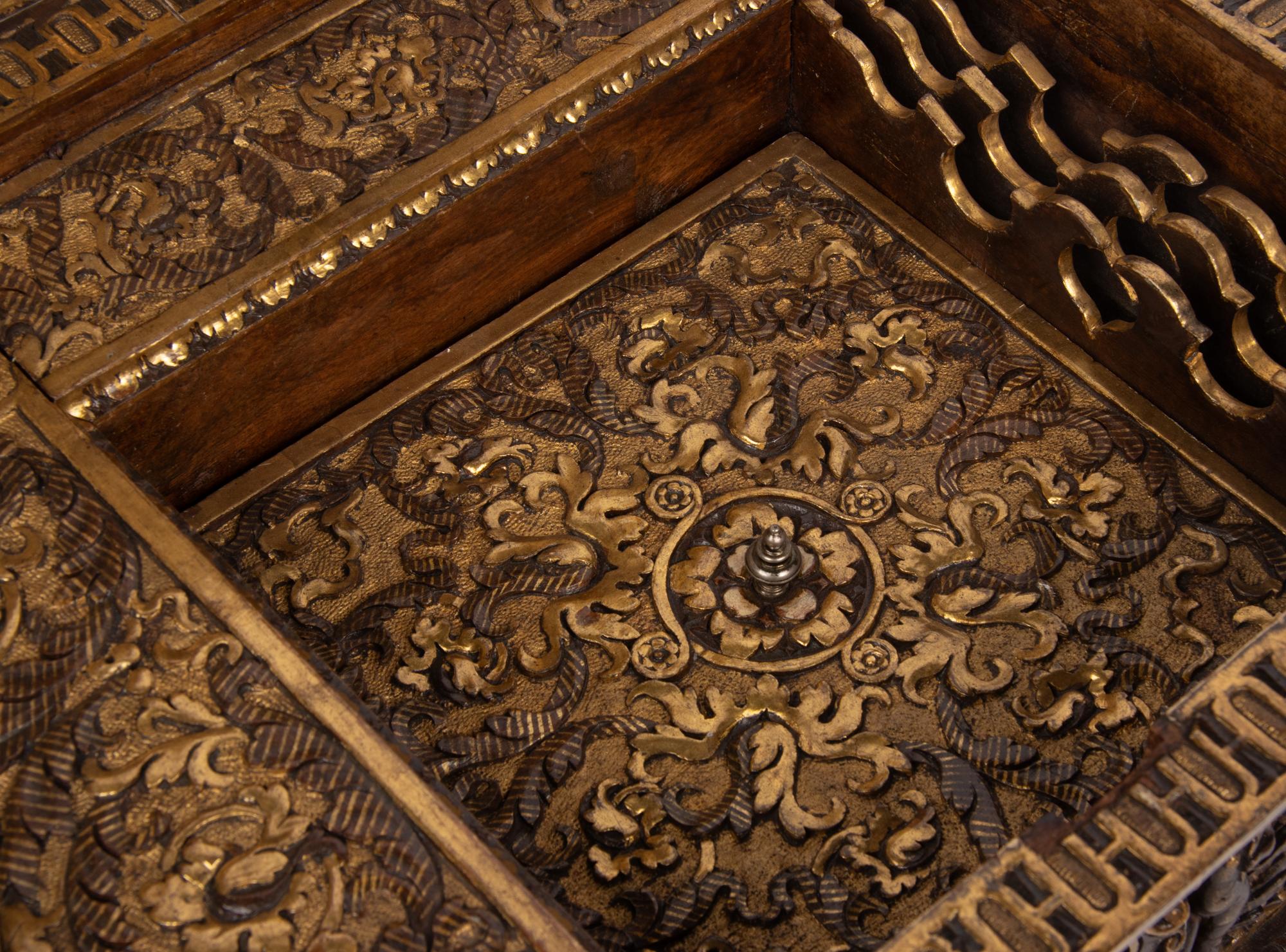 An Italian Parcel Gilt and Carved Walnut Orpheus and Eurydice Casket