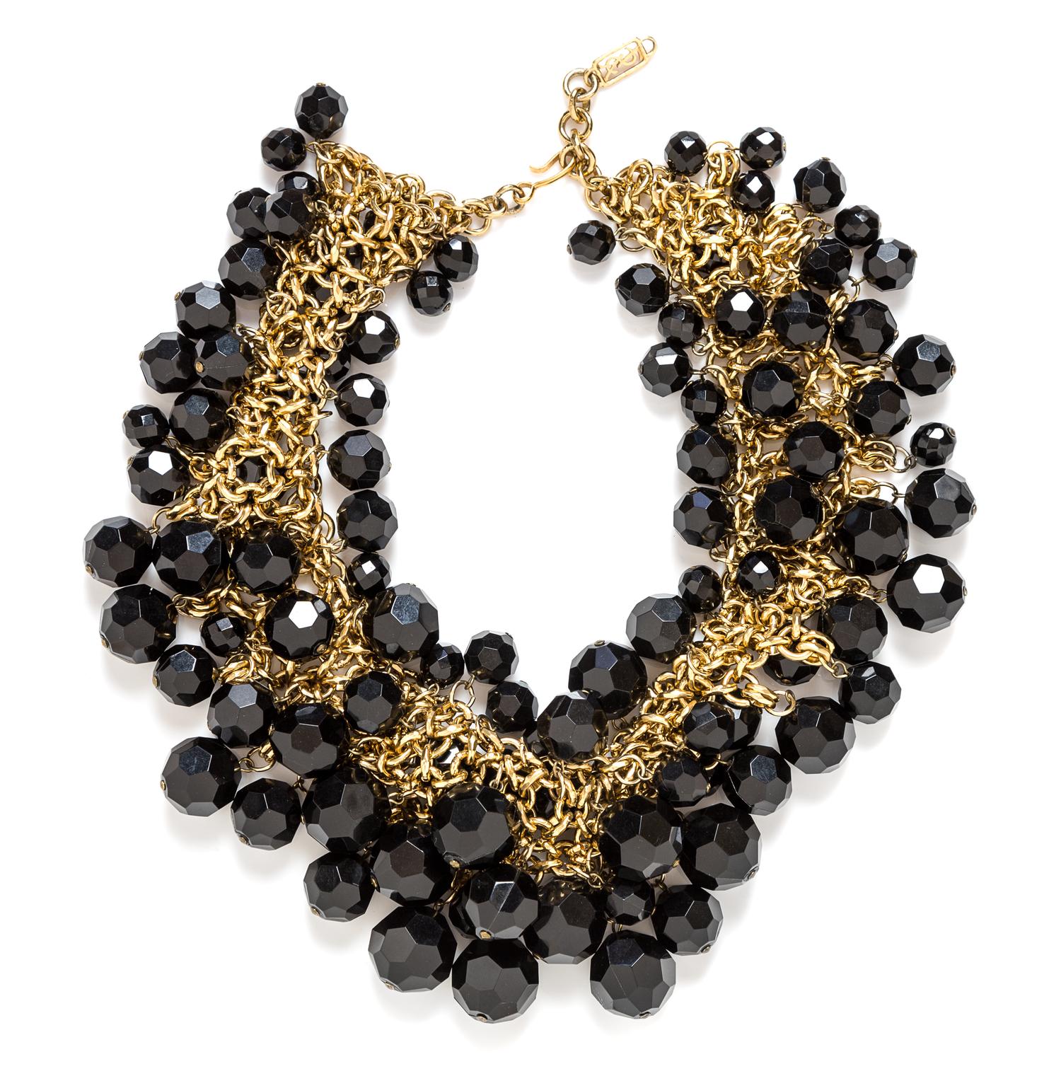 An Yves Saint Laurent Goldtone and Black Bead Cluster Necklace, 16.75" long with a 2.25" extension.