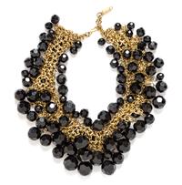An Yves Saint Laurent Goldtone and Black Bead Cluster Necklace, 16.75" long with a 2.25" extension.