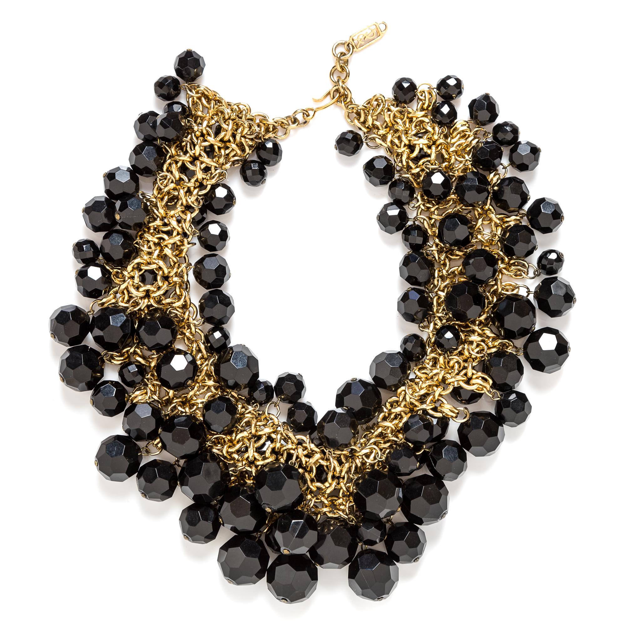 An Yves Saint Laurent Goldtone and Black Bead Cluster Necklace, 16.75" long with a 2.25" extension.