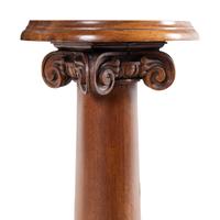 A Carved Mahogany Pedestal