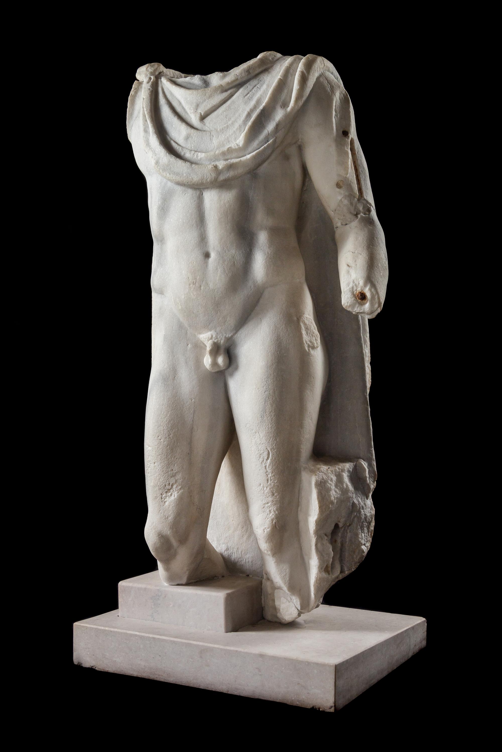 A Roman or Later Marble Torso of a God