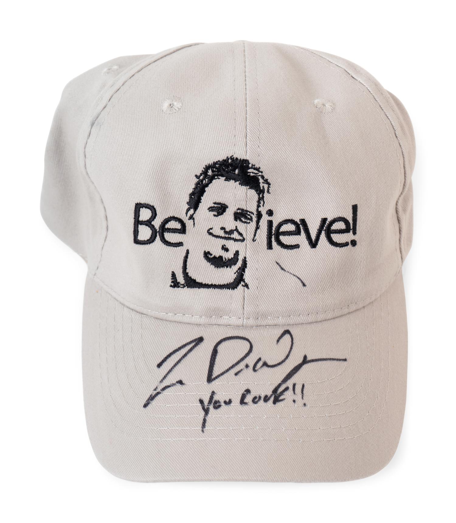 (Film Clothes) A group of unsigned hats and a book from movies and TV shows, comprising: