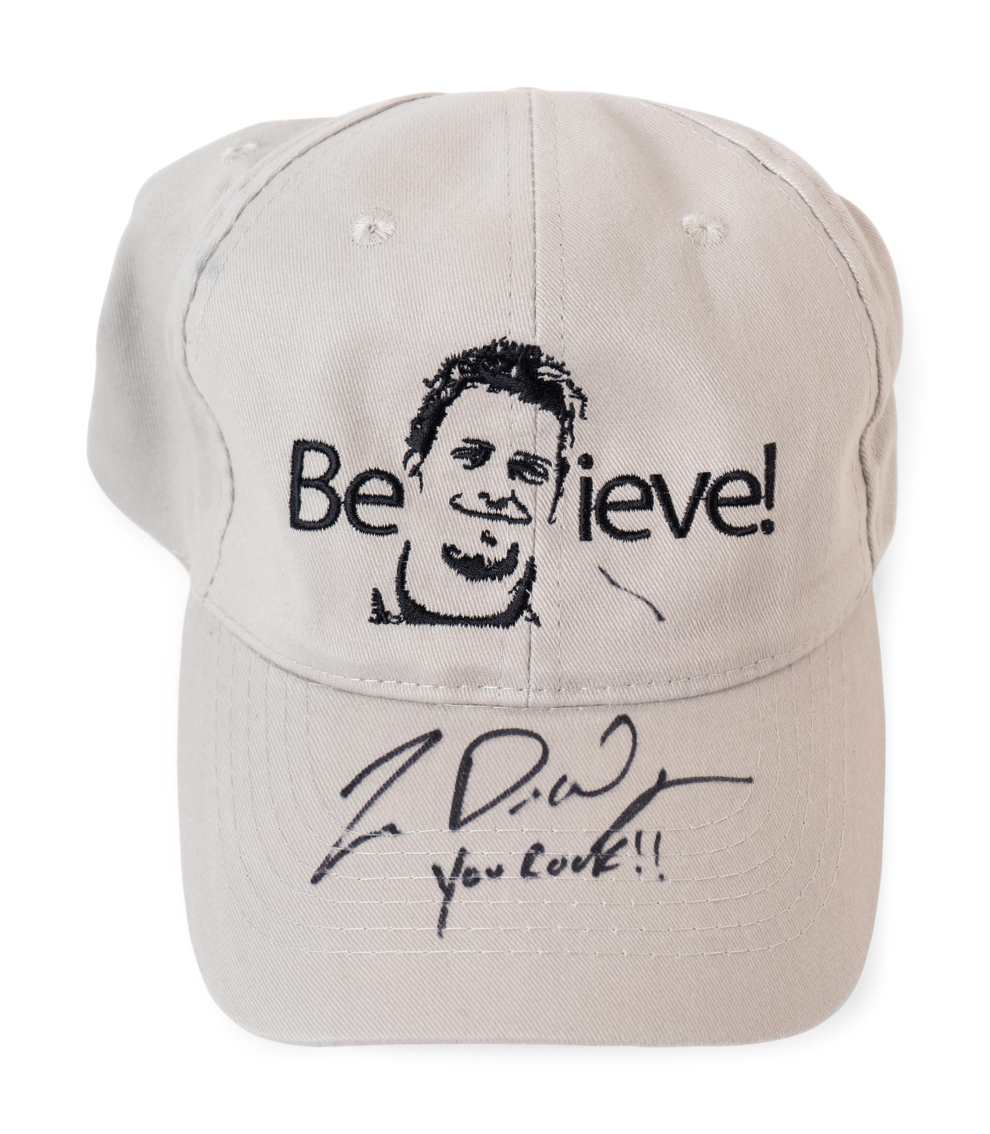 (Film Clothes) A group of unsigned hats and a book from movies and TV shows, comprising: