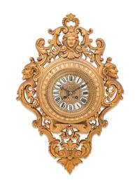 A Neoclassical Gilt Metal Cartel Clock