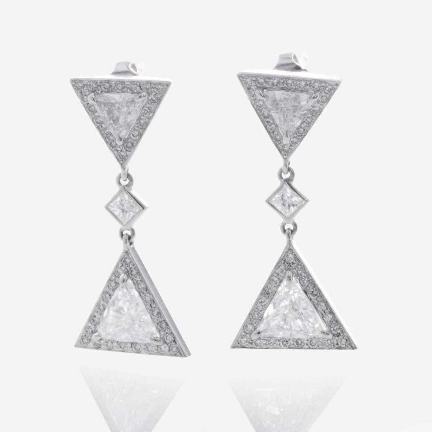 A Pair of Diamond and 18K White Gold Stud Earrings