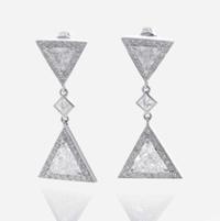 A Pair of Diamond and 18K White Gold Stud Earrings