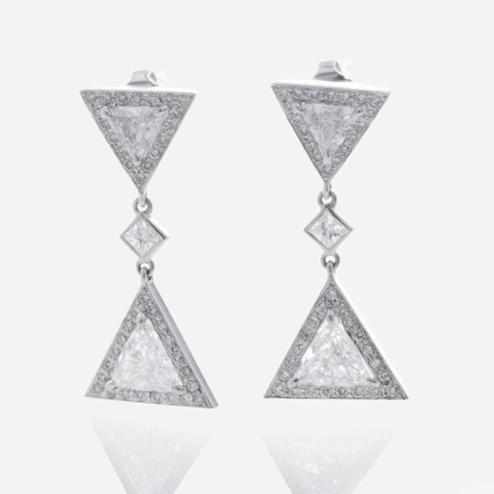 A Pair of Diamond and 18K White Gold Stud Earrings
