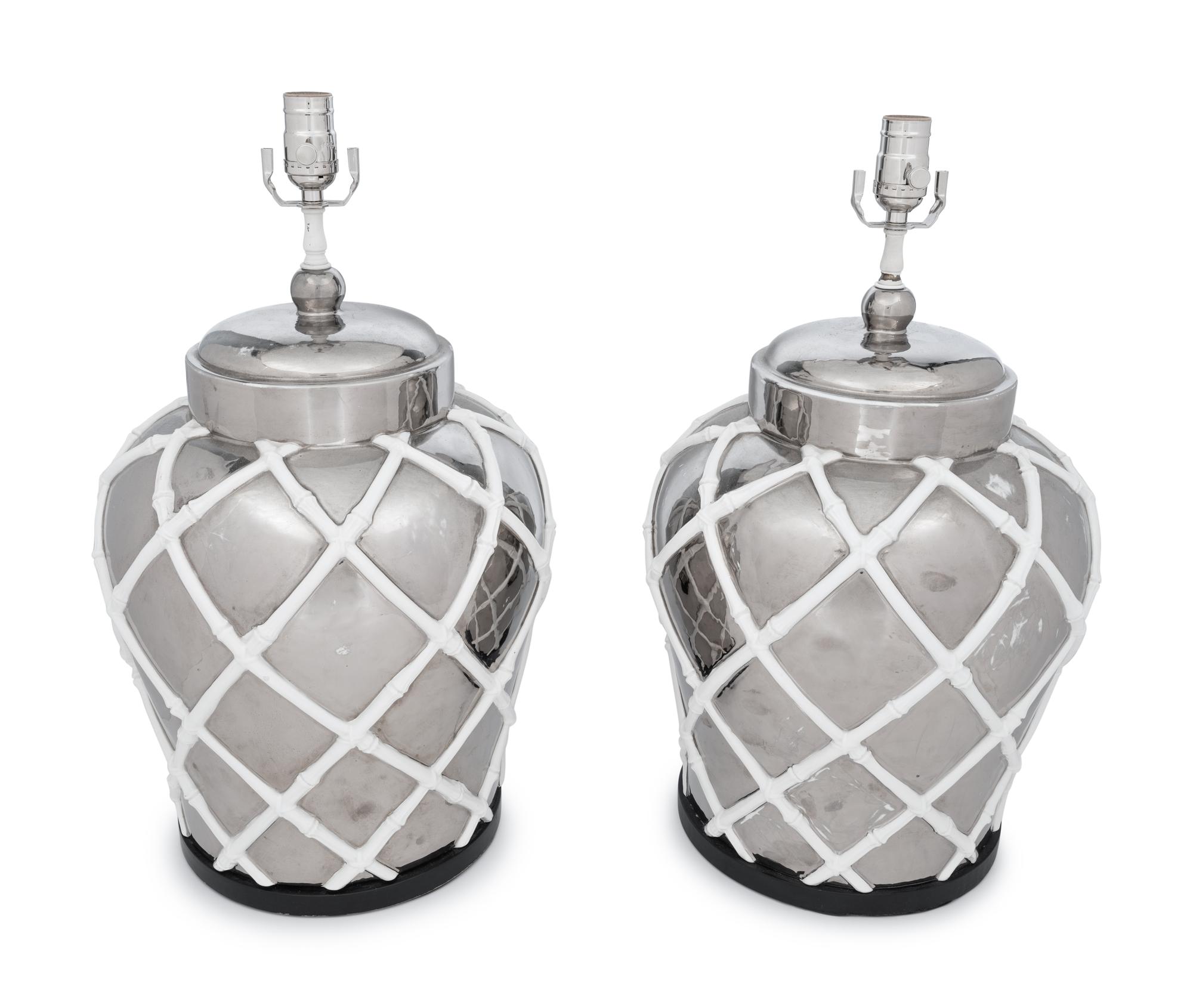 A Pair of Silvered and White Glazed Table Lamps