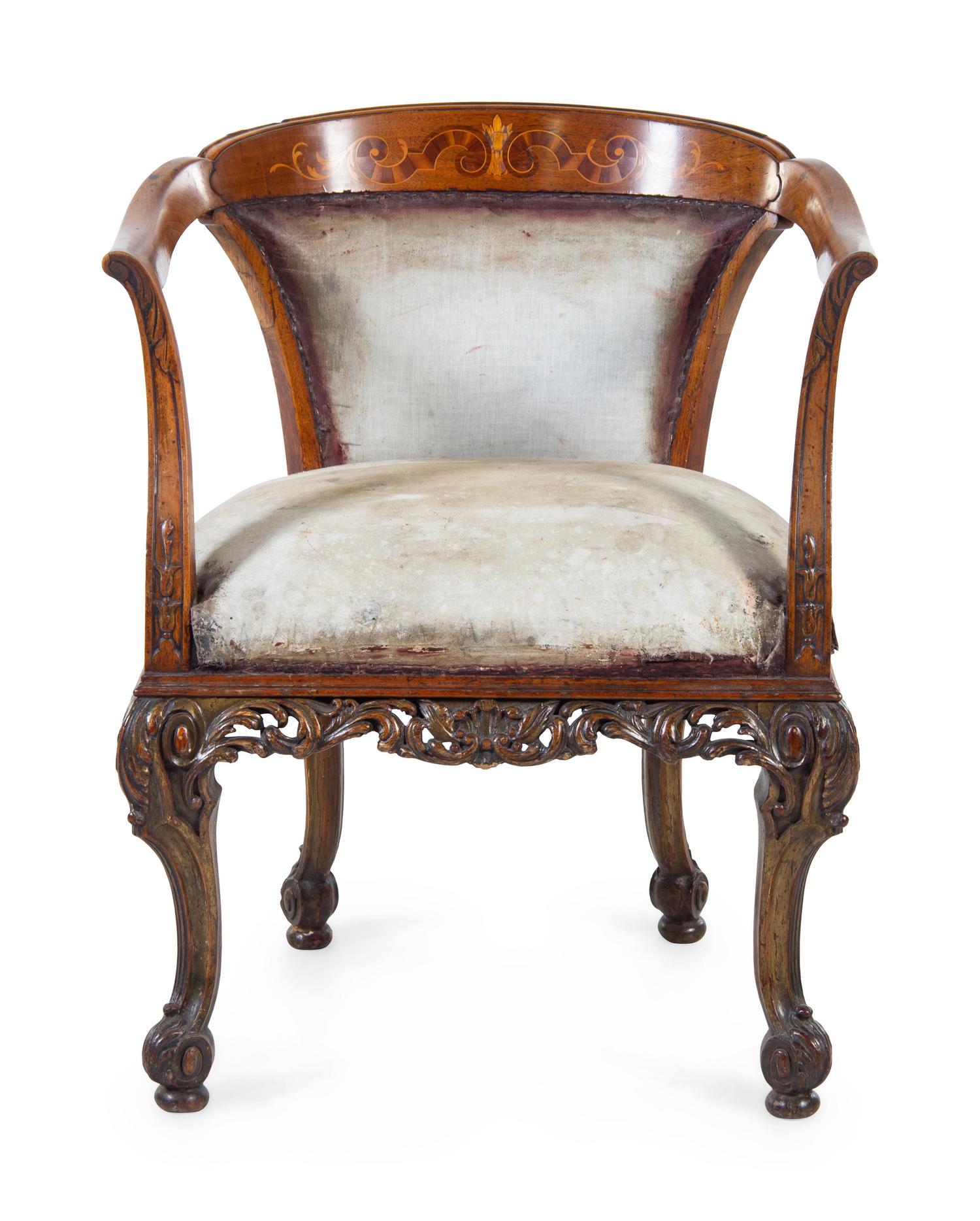 A Continental Carved and Marquetry Decorated Armchair