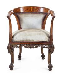A Continental Carved and Marquetry Decorated Armchair