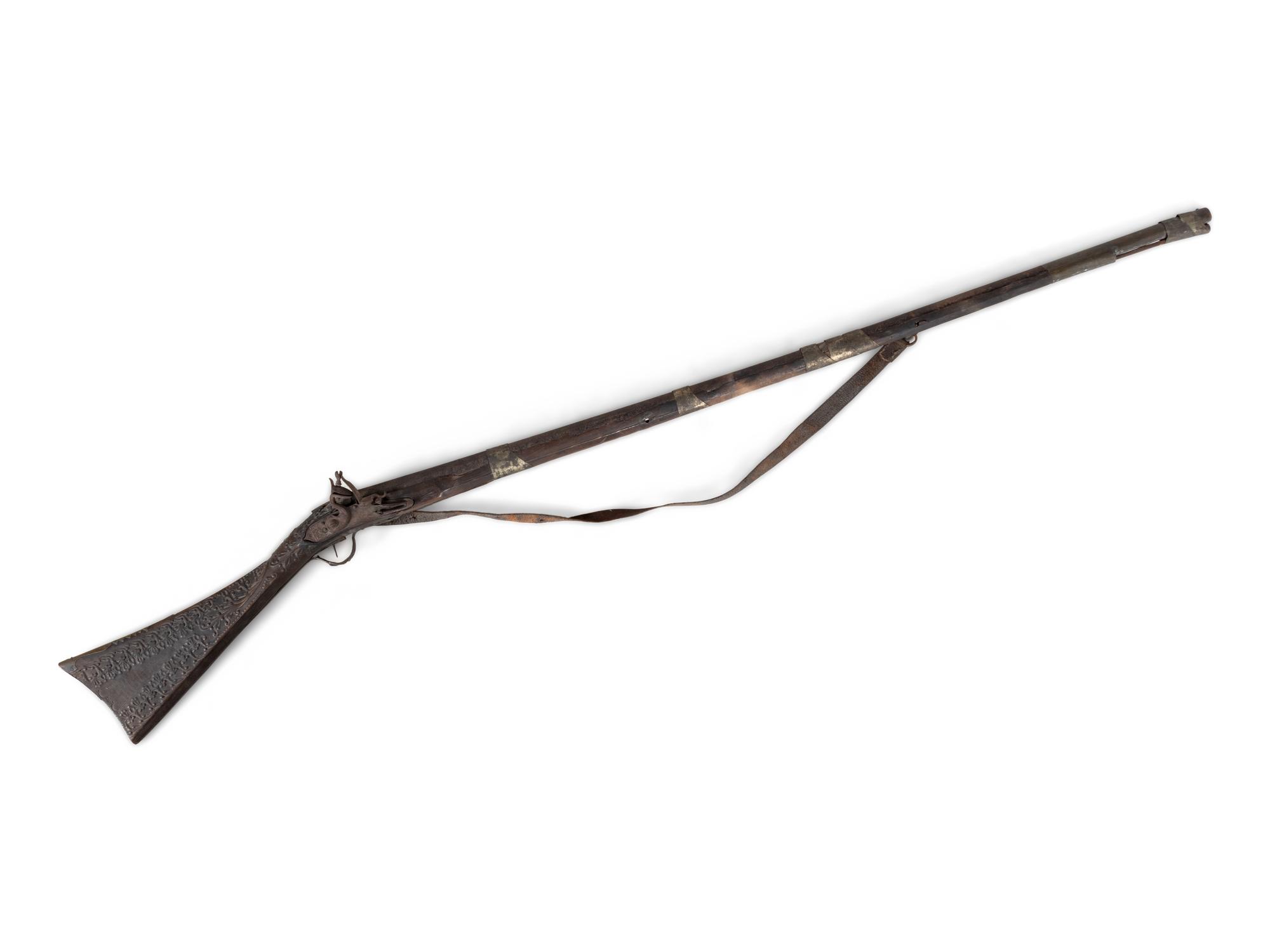 An Egyptian or Near Eastern Metal Inlaid Flintlock Rifle