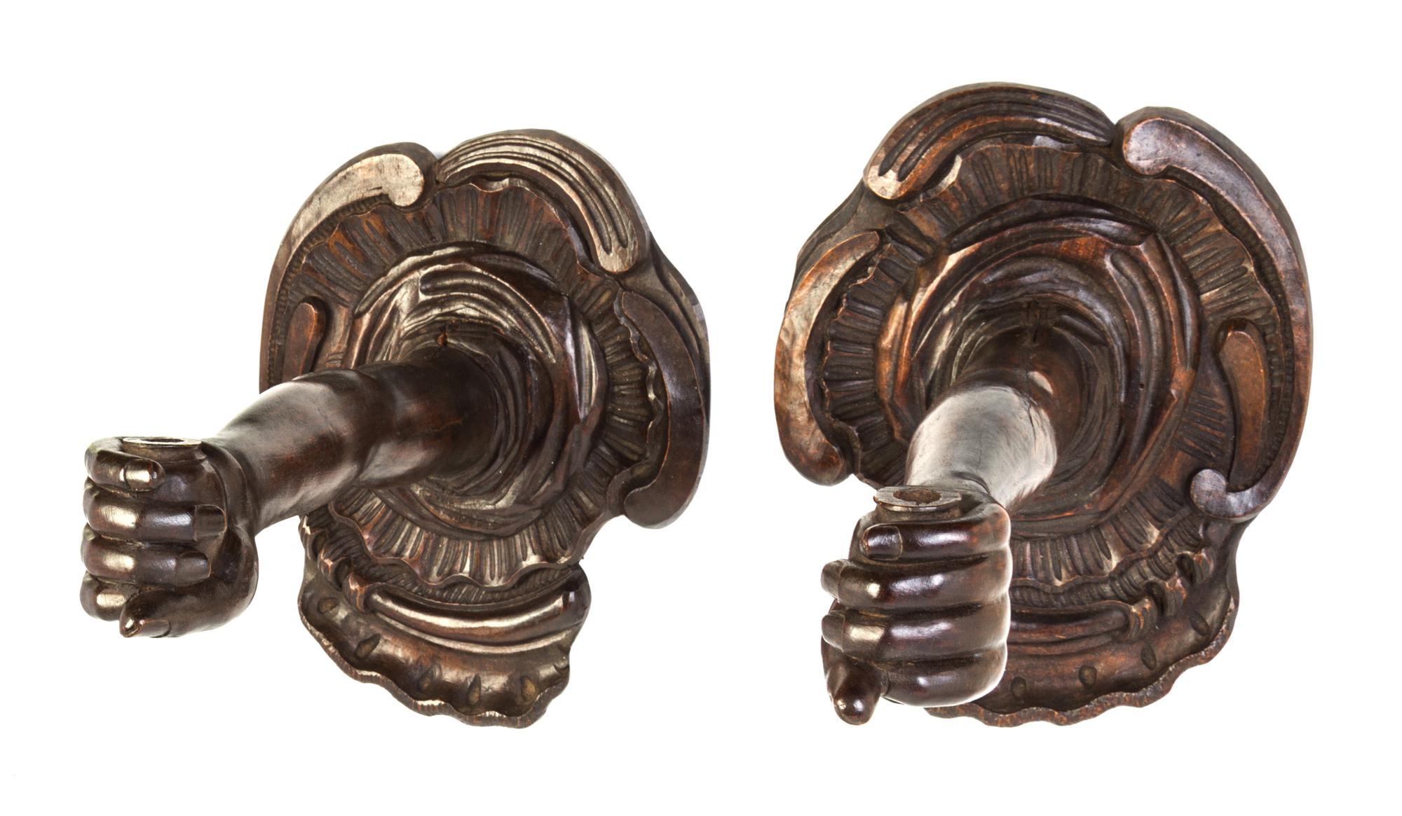A Pair of Baroque Style Arm Form Wall Lights Height 12 1/2 x width 10 x depth 17 inches.