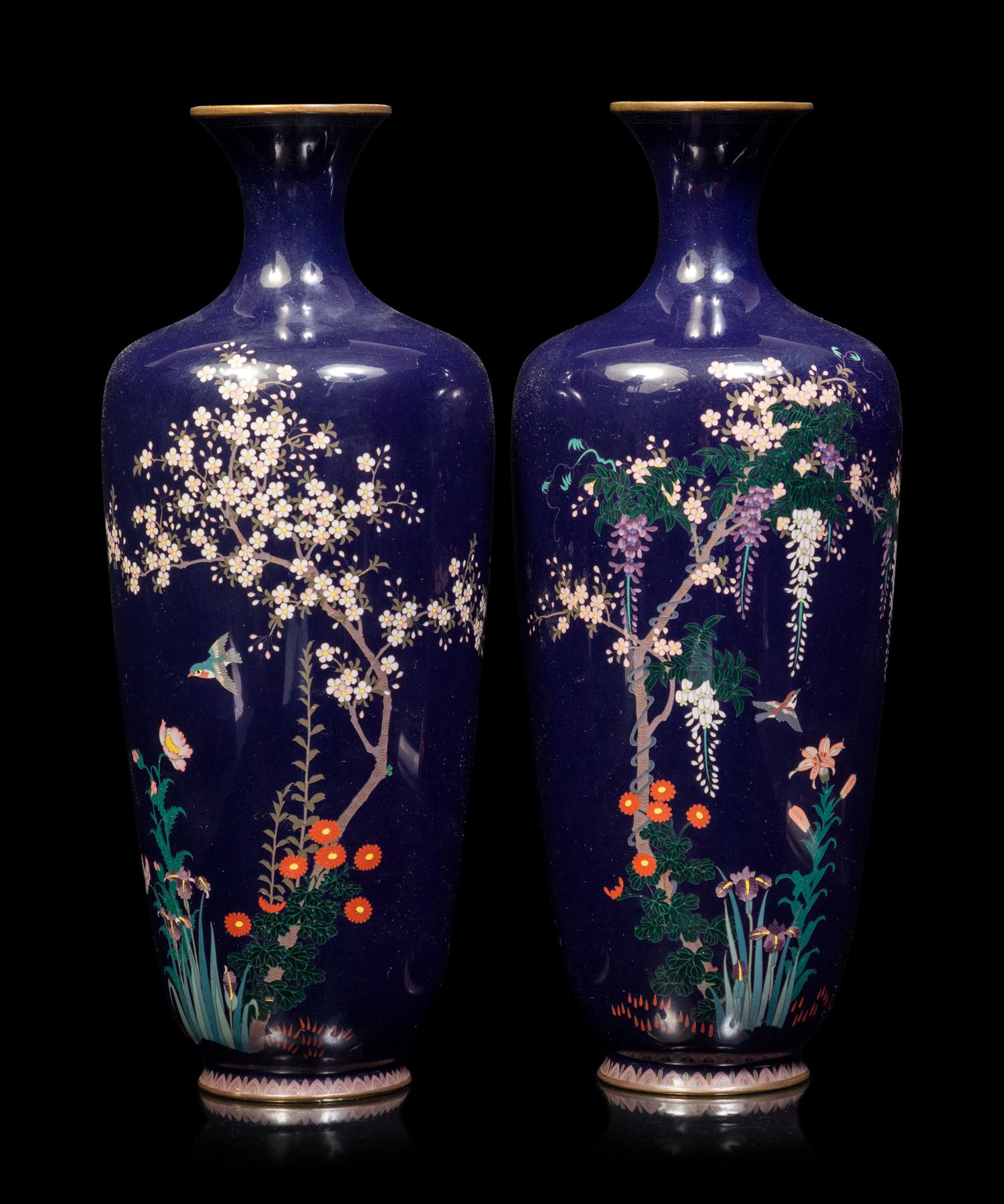 A Pair of Black Ground Cloisonné Vases and A Black Ground Polychrome Enameled Porcelain Charger