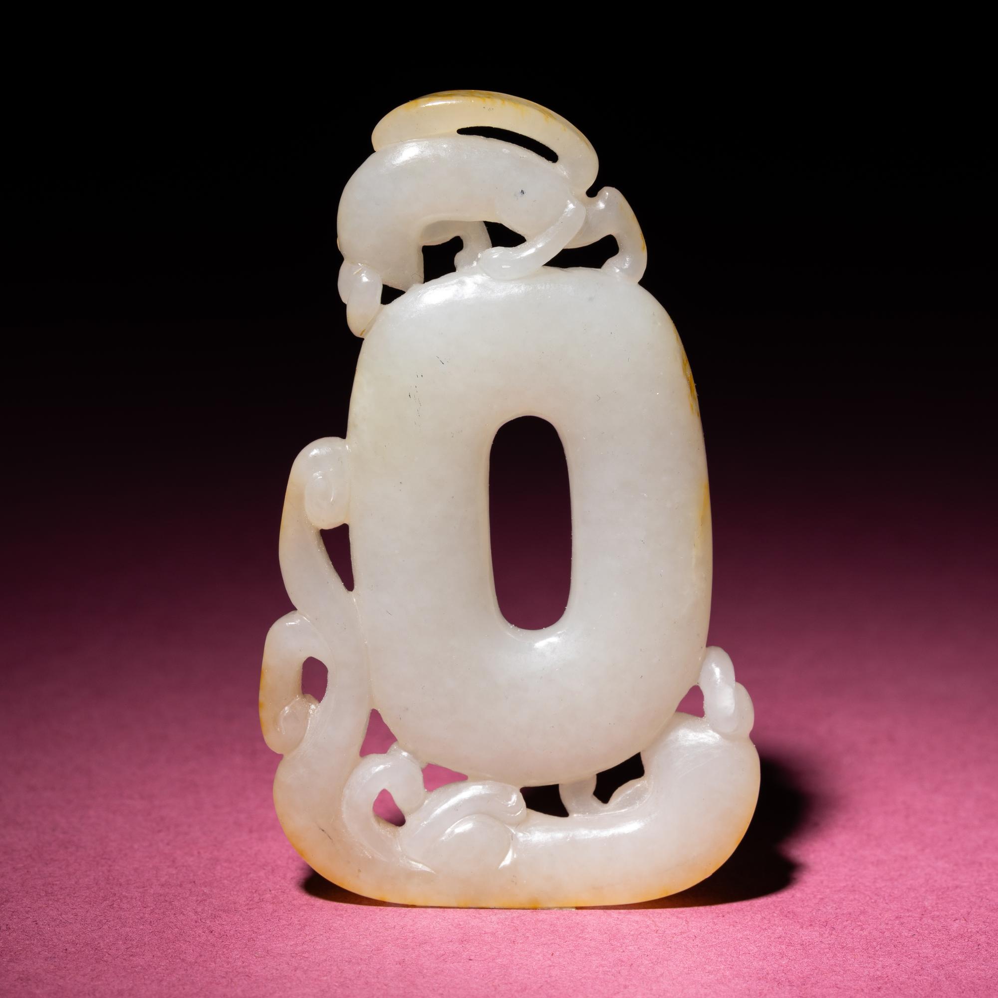 A Chinese Russet and White Jade 'Chilong' Pendant, 18th/19th Century — 清中期 白玉留皮螭龍紋佩