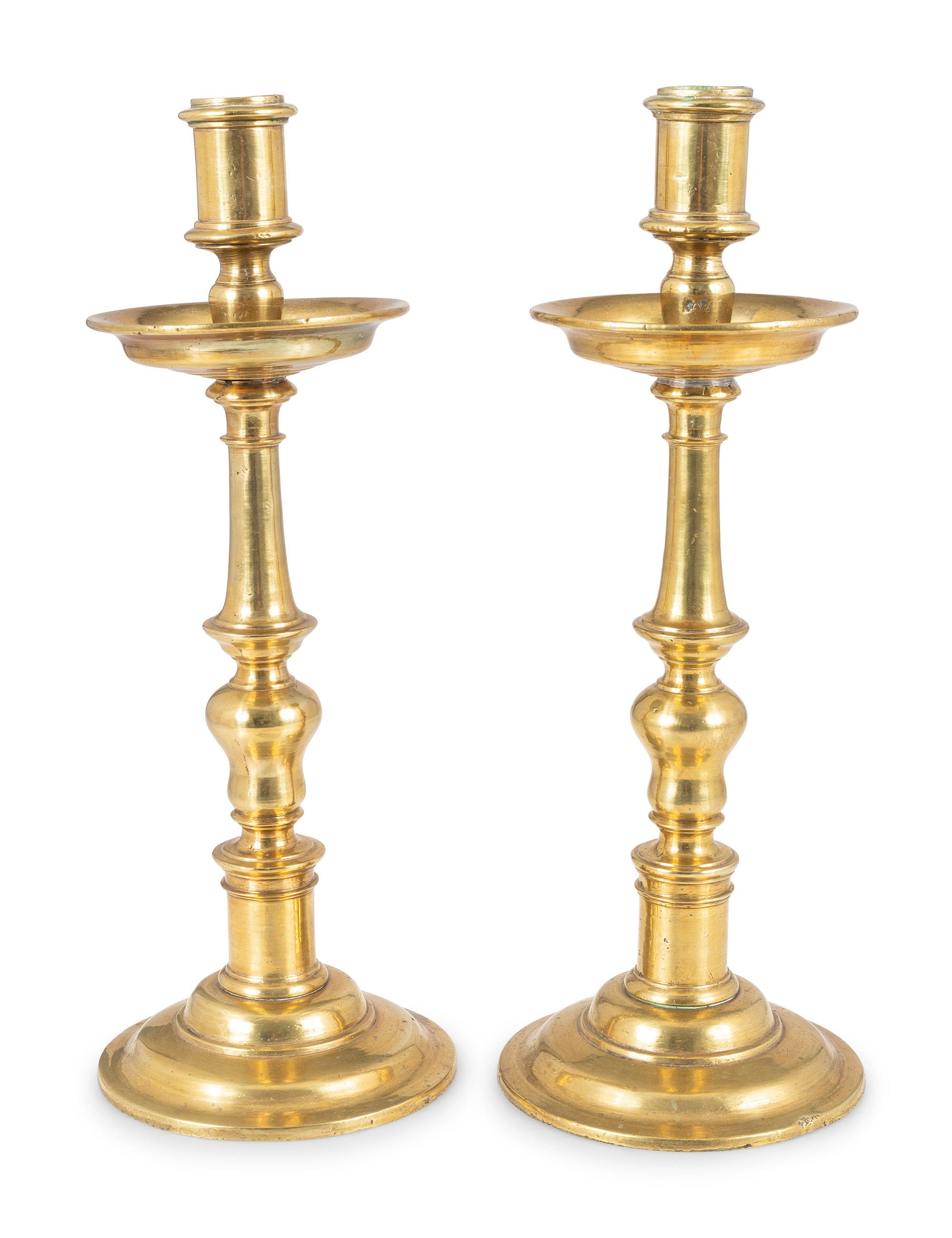 A Pair of Continental Brass Candlesticks