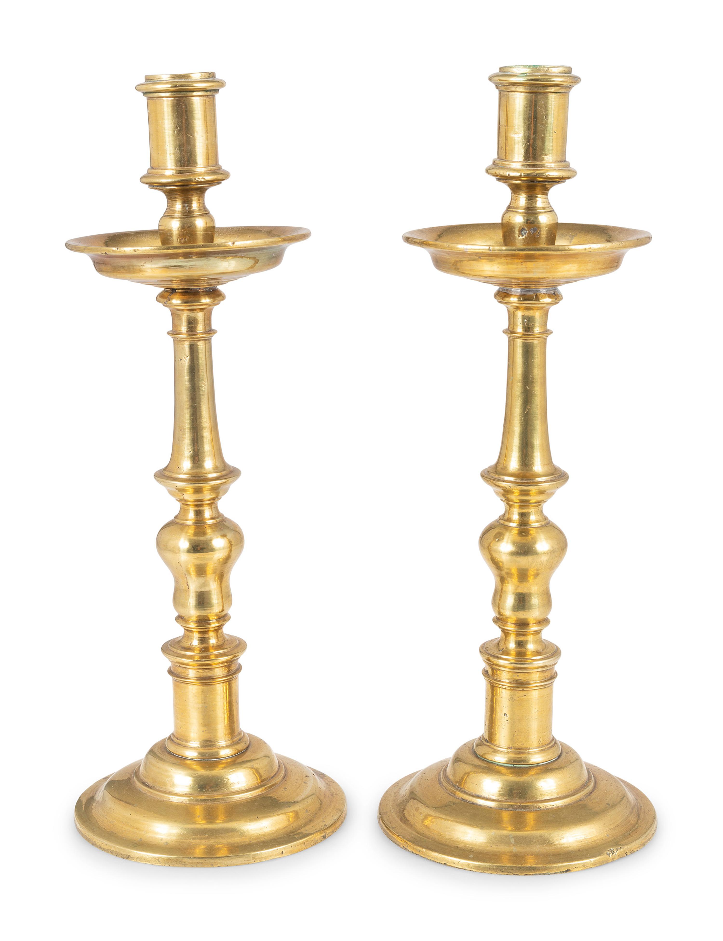 A Pair of Continental Brass Candlesticks