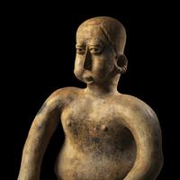 A Jalisco Terracotta Seated Male Figure