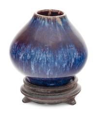 A Flambé Glazed Peach-Form Jar