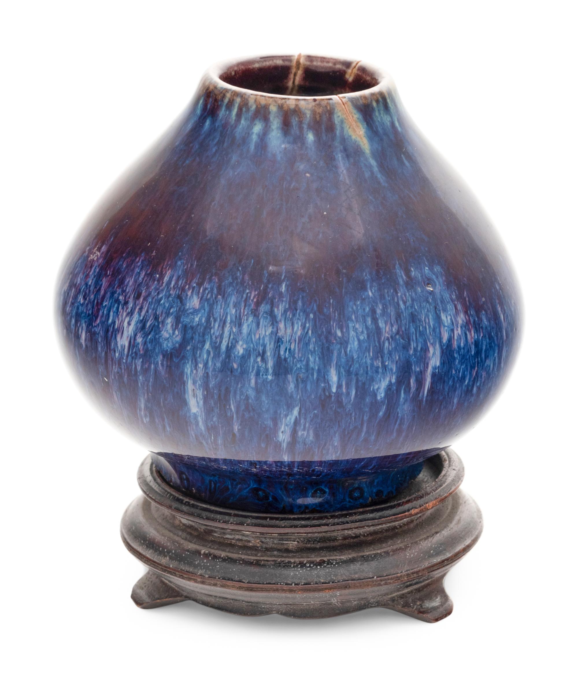 A Flambé Glazed Peach-Form Jar