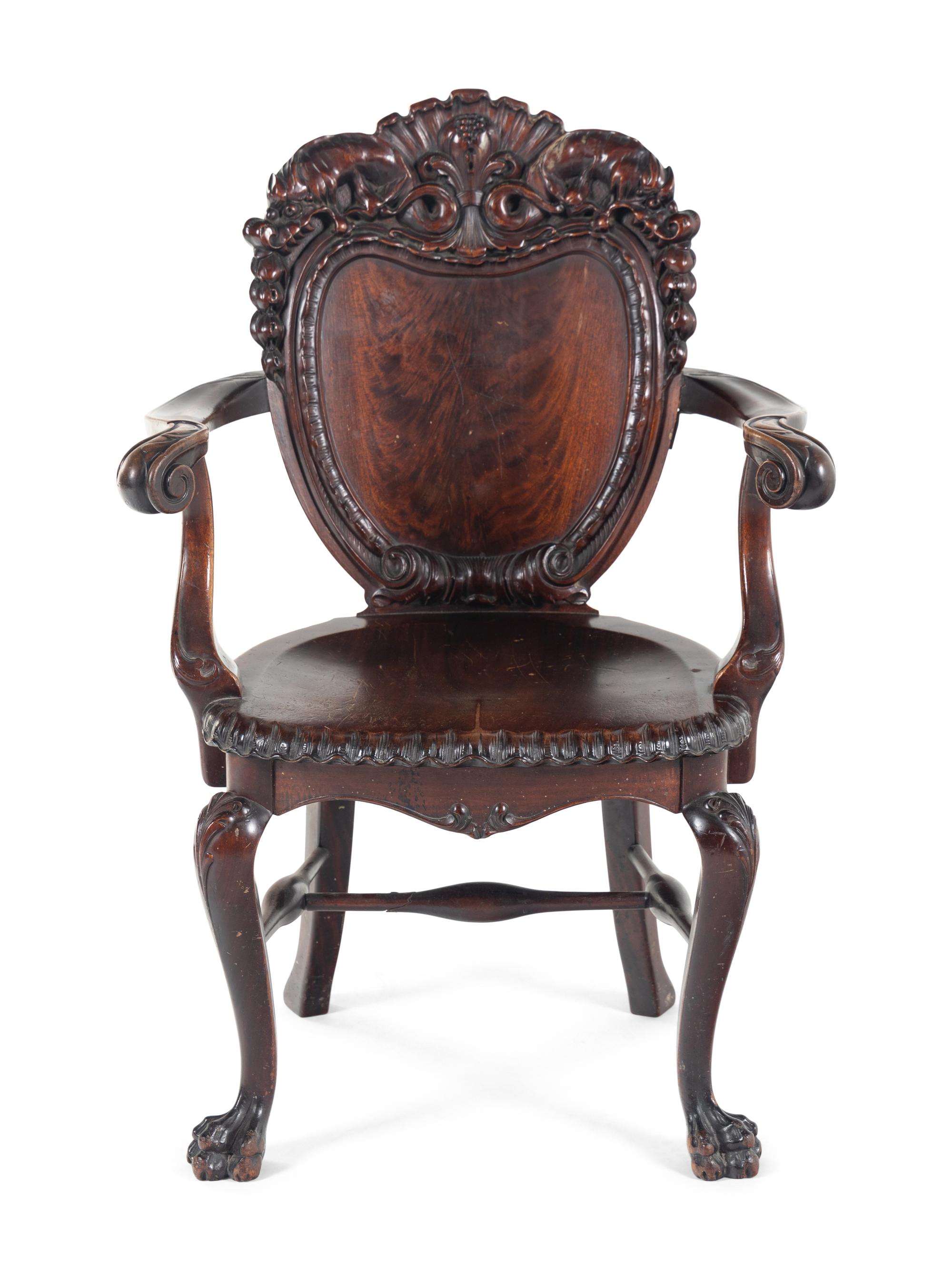 A Baroque Revival Carved Mahogany Armchair